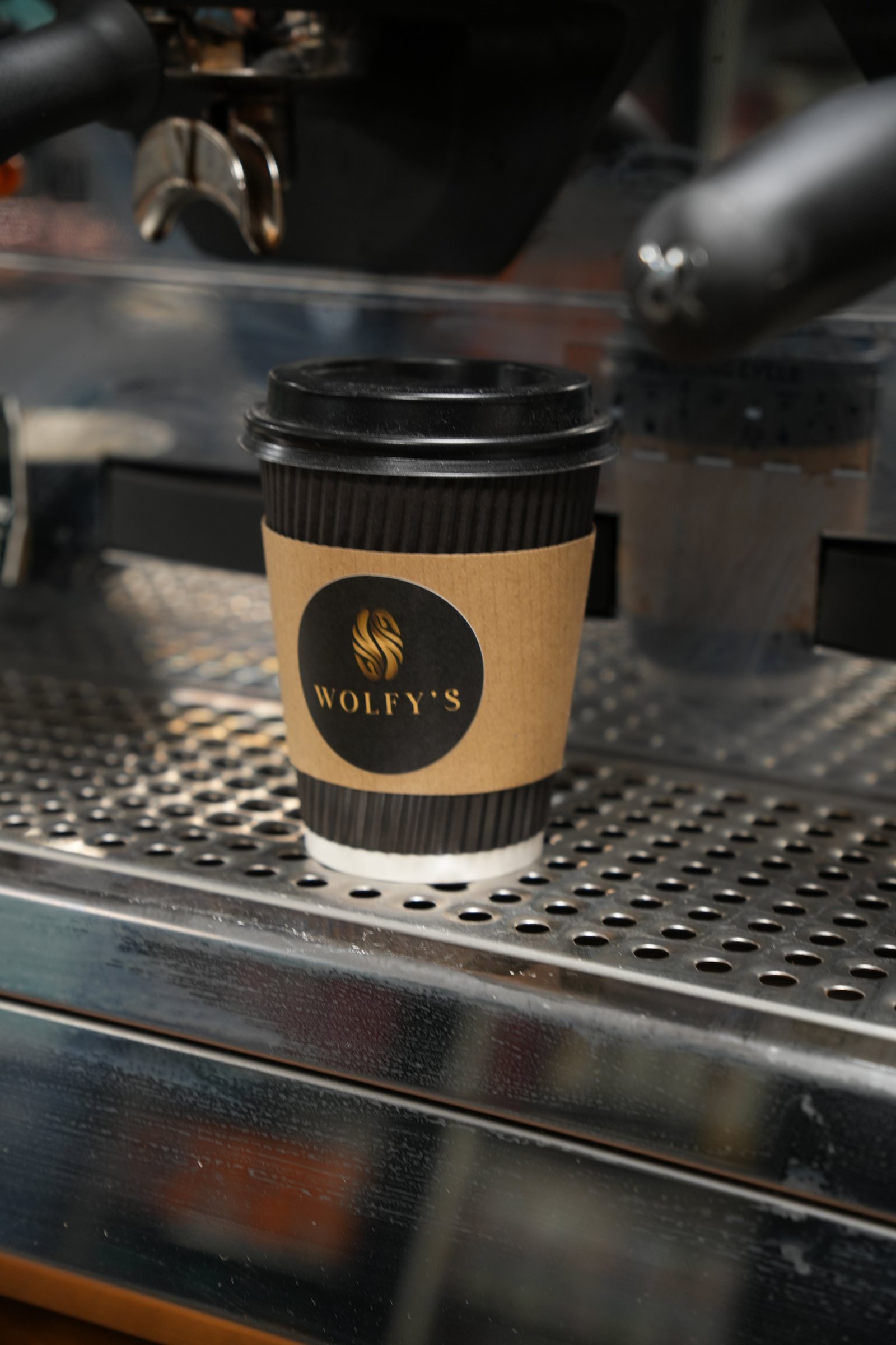 Wolfy's branded coffee cup